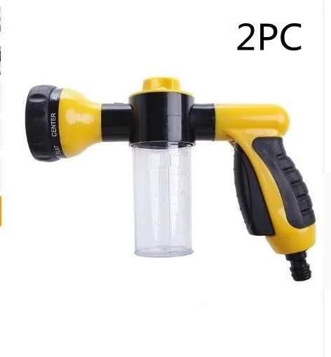 Green high pressure foam spray gun with adjustable nozzle for car washing and household cleaning.